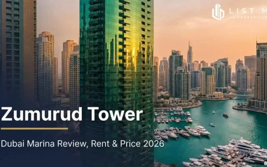 Zumurud Tower, a green-glass residential tower in Dubai Marina, in 2026